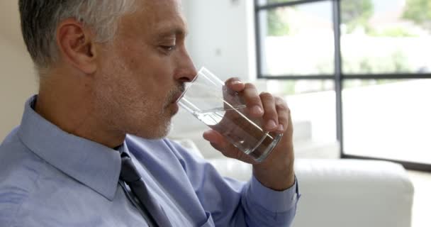Man drinking water glass — Stock Video