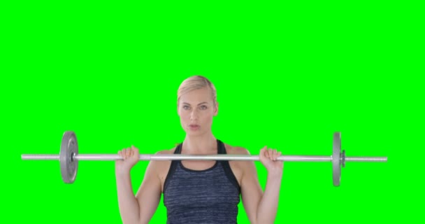Mujer levantando una mancuerna — Vídeos de Stock
