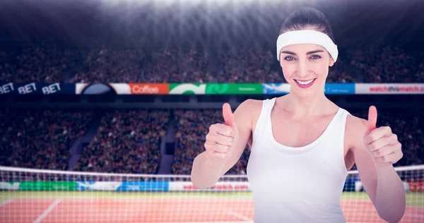 Female athlete showing thumbs up — Stock Photo, Image