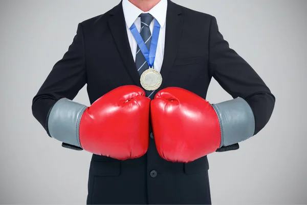 Businessman with boxing gloves — Stock Photo, Image