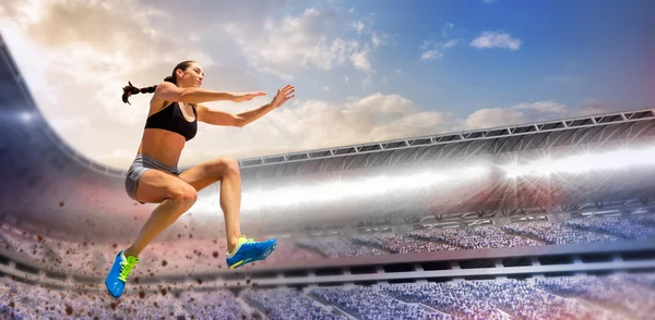 Sporty woman jumping — Stock Photo, Image