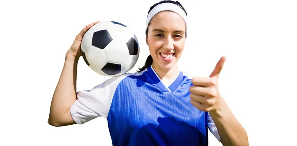 Mujer futbolista sosteniendo un fútbol — Foto de Stock