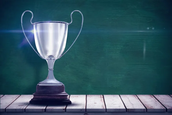 Trophy against green background — Stock Photo, Image