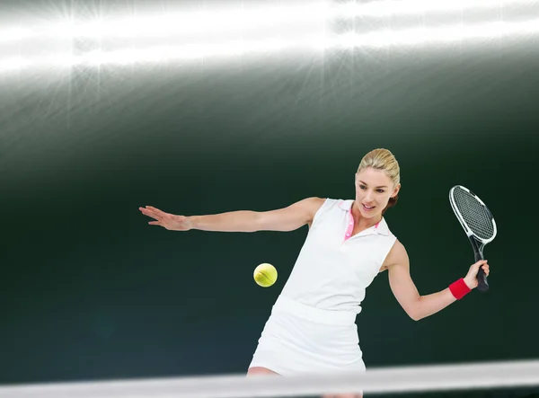 Athlete playing tennis with a racket — Stock Photo, Image