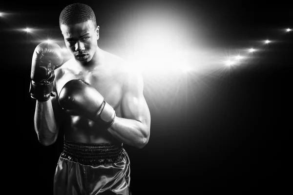 Boxer performing uppercut — Stock Photo, Image