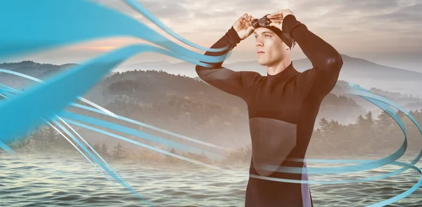 Nadador en traje de neopreno con gafas de natación — Foto de Stock