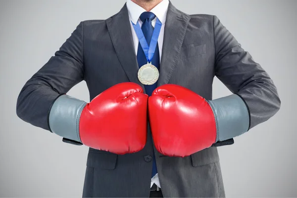 Businessman with boxing gloves — Stock Photo, Image