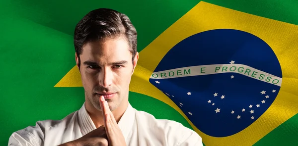 Portrait of fighter performing hand salute — Stock Photo, Image