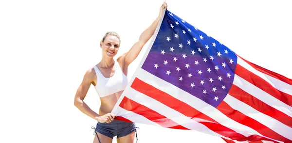 拿着美国国旗的女运动员 — 图库照片