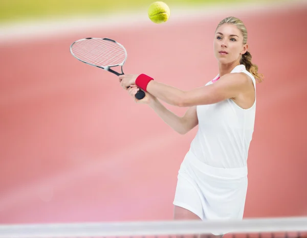 Athlete playing tennis with a racket — Stock Photo, Image