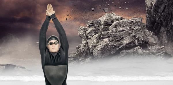 Swimmer in wetsuit while diving — Stock Photo, Image