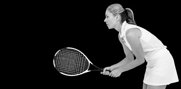Спортсмен играет в теннис с ракеткой — стоковое фото