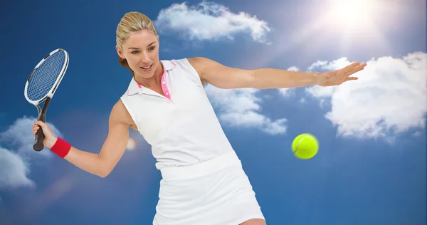 Athlete playing tennis with a racket — Stock Photo, Image