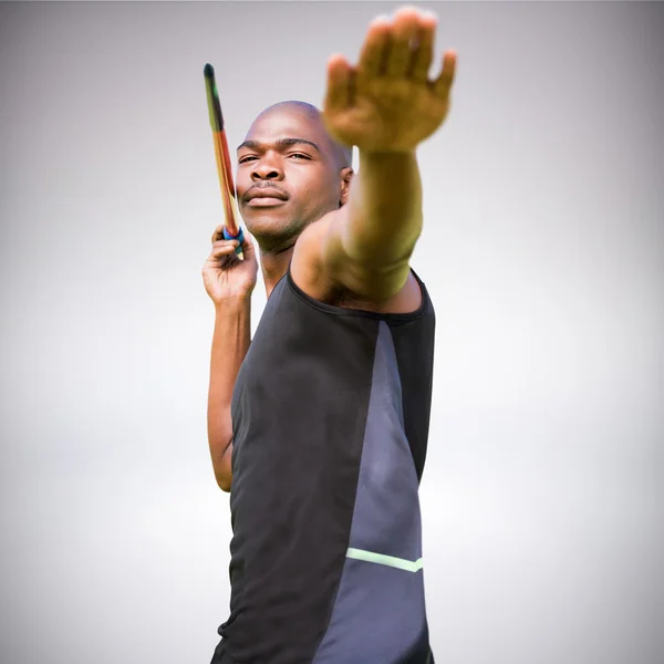 Sportsman practising a javelin throw — Stock Photo, Image