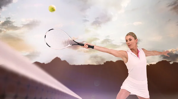 stock image athlete playing tennis with a racket 