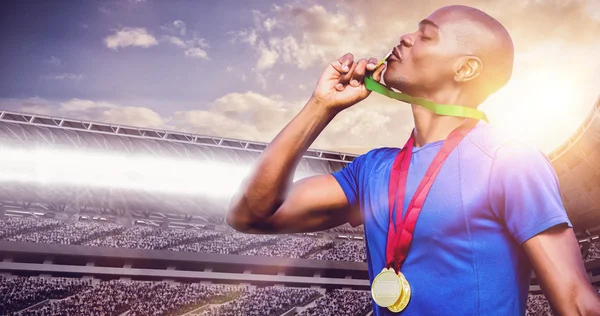 Winner kissing medals — Stock Photo, Image