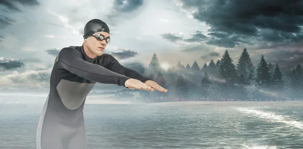 Schwimmer im Neoprenanzug beim Tauchen — Stockfoto