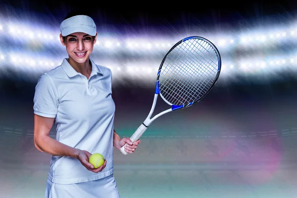 Athlète féminine jouant au tennis — Photo