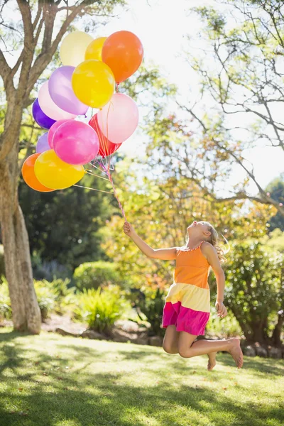 Girl playing with balloons — Stock Photo, Image