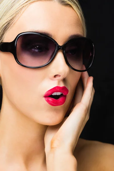Woman in glasses posing for camera — Stock Photo, Image