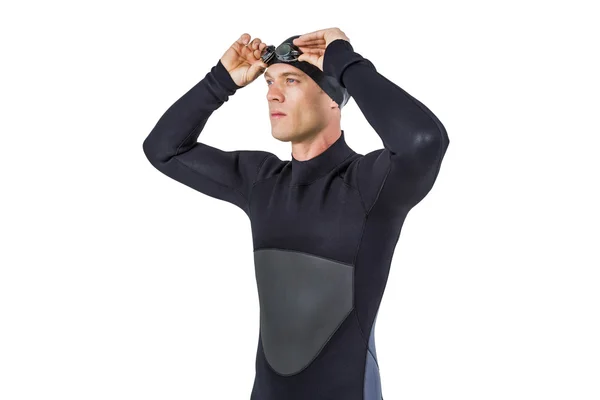 Wetsuit giyen yüzme yüzücü gözlüğü — Stok fotoğraf