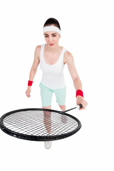 Athlète féminine jouant au badminton — Photo