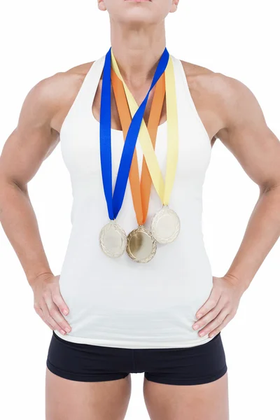 Жінка-спортсменка в медалях — стокове фото