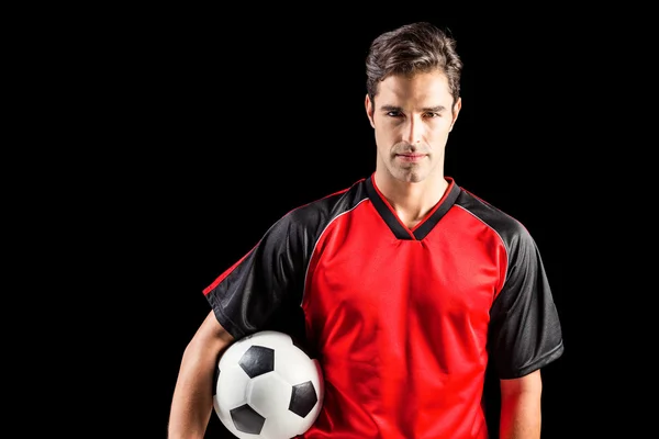 Portrét jistý sportovec drží fotbal — Stock fotografie