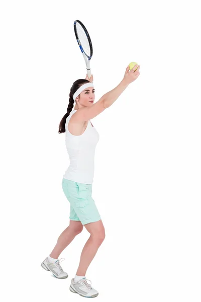 Athlète féminine jouant au tennis — Photo