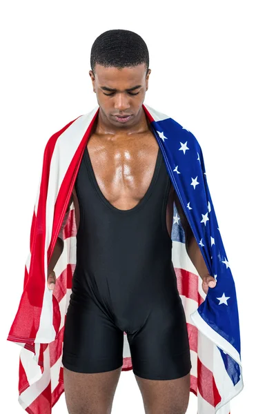 Atleta com bandeira americana enrolada em torno de seu corpo — Fotografia de Stock