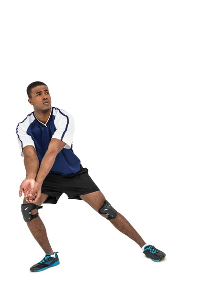 Deportista posando mientras juega voleibol — Foto de Stock