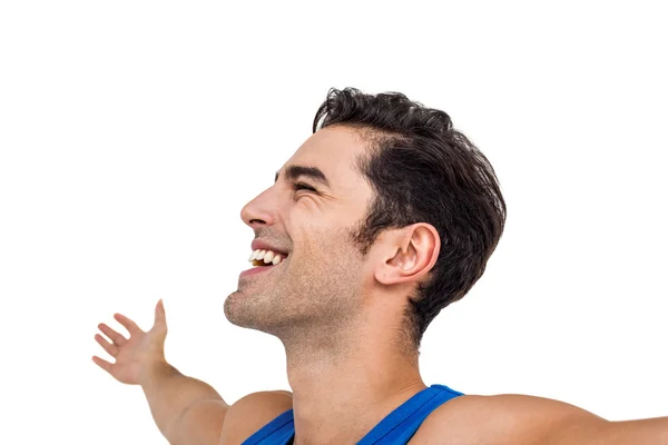 Glada manliga friidrottare med armarna utsträckta — Stockfoto