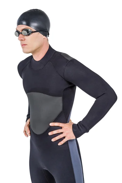 Уверенный пловец в гидрокостюме — стоковое фото