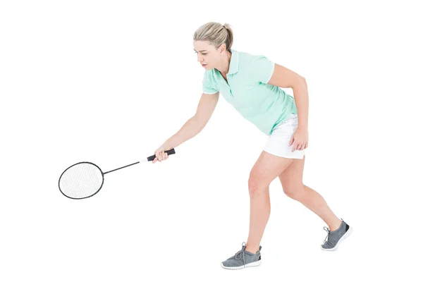 Loira bonita jogando badminton — Fotografia de Stock