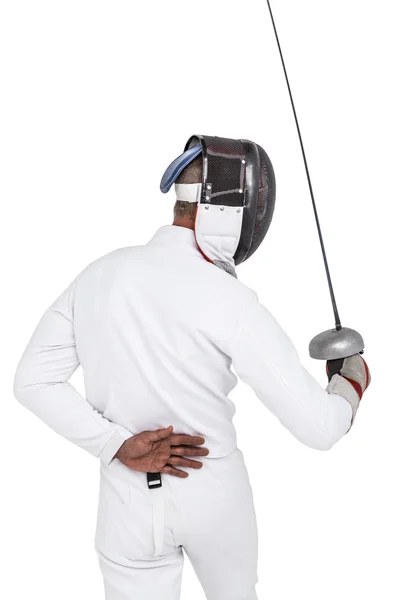 Man wearing fencing suit practicing with sword — Stock Photo, Image