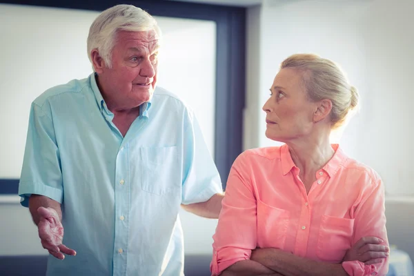 Senior man shouting on senior woman — Stock Photo, Image