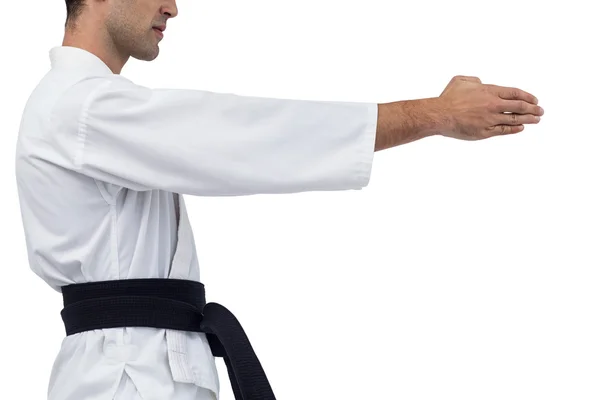 Sección media del luchador realizando postura de karate — Foto de Stock