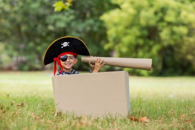 Boy pretending to be a pirate clipart