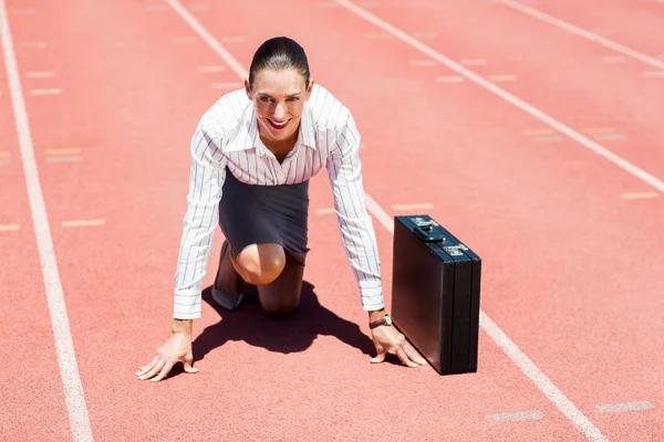 Happy businesswoman with briefcase — Stock Photo, Image