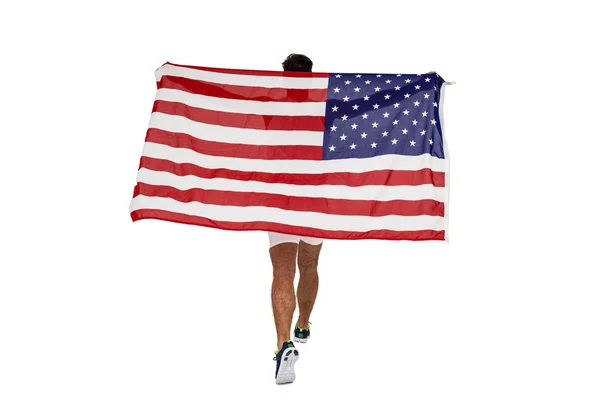 Atleta posando con bandera americana después de la victoria — Foto de Stock