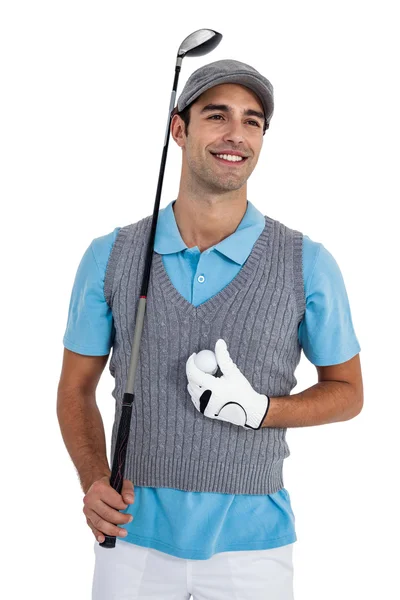 Jugador de golf feliz de pie con pelota de golf y club de golf — Foto de Stock