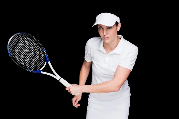 Atleta femenina jugando tenis —  Fotos de Stock