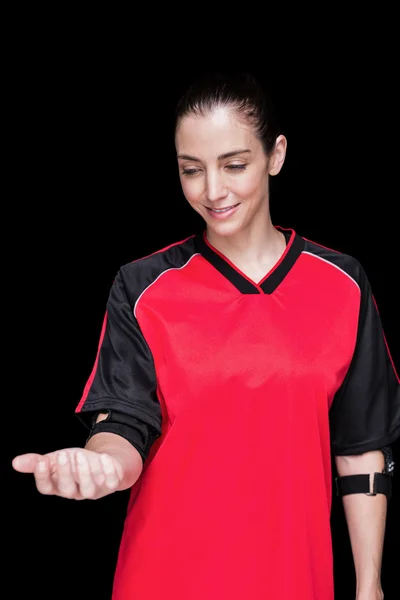 Atleta feminina posando com cotovelo pad — Fotografia de Stock