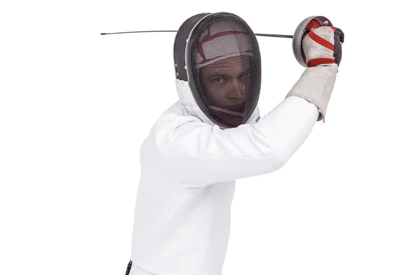 Hombre con traje de esgrima practicando con espada —  Fotos de Stock