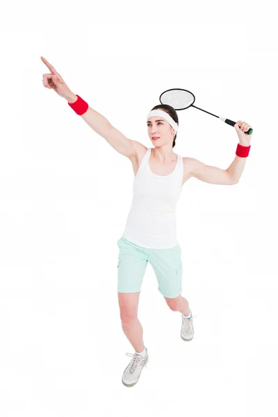 Atleta feminina jogando badminton — Fotografia de Stock