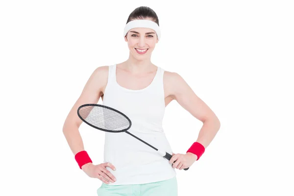 Athlète féminine jouant au badminton — Photo