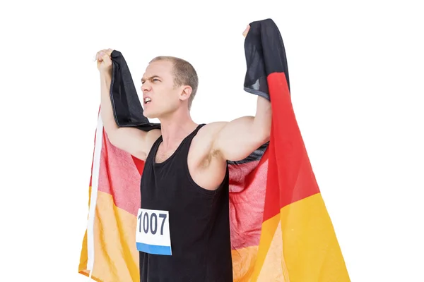 Atleta posando com bandeira alemã após a vitória — Fotografia de Stock