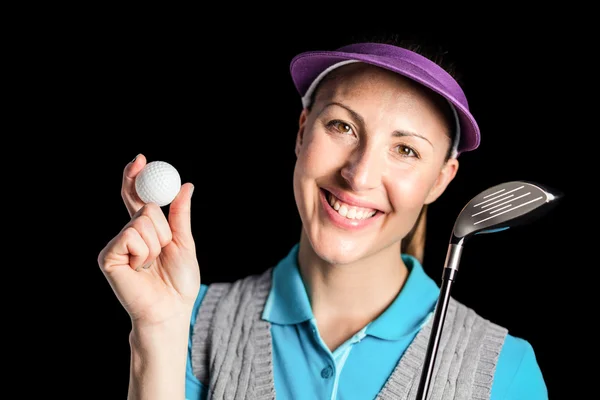 Игрок в гольф позирует с клюшкой для гольфа и мячом для гольфа — стоковое фото