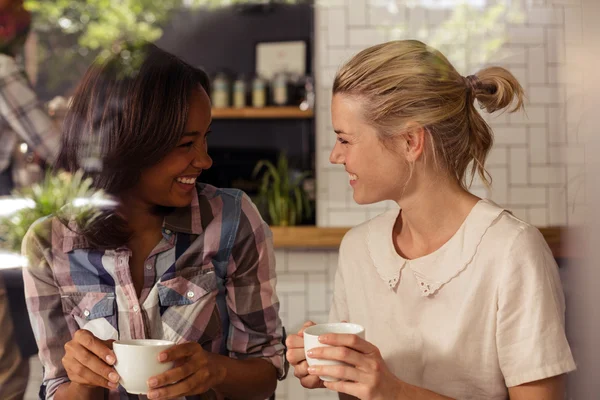 Two customers drinking coffee — Stock Photo, Image