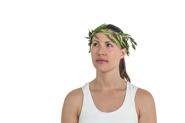 Female athlete wearing green roman laurel wreath — Stock Photo, Image